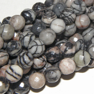 Hel sträng – Black veined jaspis facetterad rund 6 mm