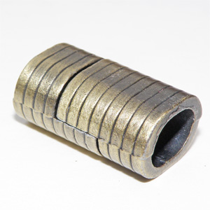 Bronsfärgat magnetlås randigt 23×14 mm