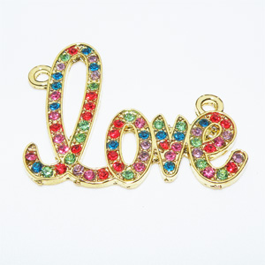 Guldfärgad metallconnector/hänge med strass ”Love” 40×33 mm