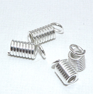 Silverfärgat avslut spiral 9x4 mm