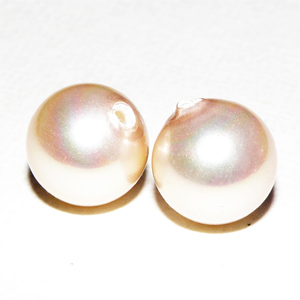 South Sea shell halvborrad svagt aprikosrosa pärla 8 mm