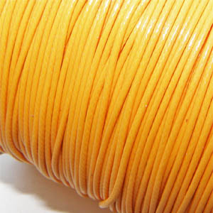 Vaxad bomullstråd ljus orange 1 mm