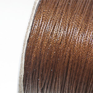 Vaxad polyestertråd brun 0,5 mm