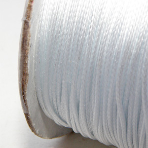 Vaxad polyestertråd vit 0,5 mm
